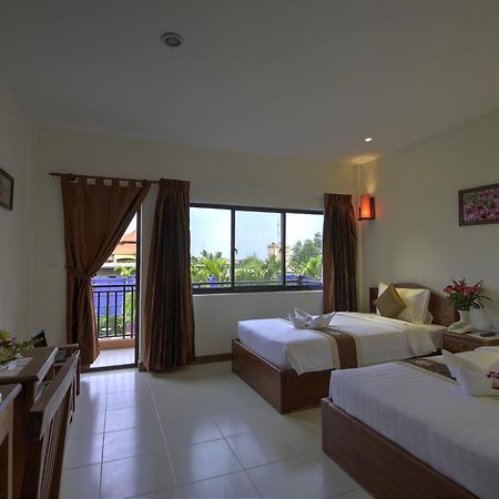 Kouprey Hotel Siem Reap Kamer foto